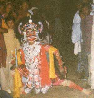 Tarakasura with red mask, takes his entry