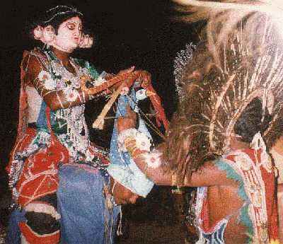 Shadanana seated on a peacock.